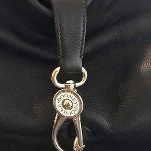 Never used. Gorgeous black Dooney and Bourne classic hobo.